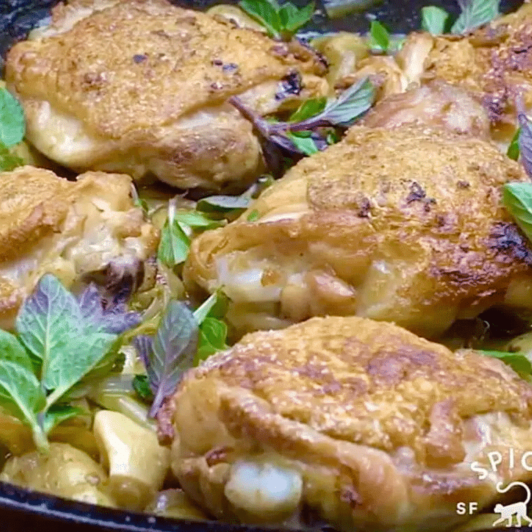 Baked Crispy Chicken Thighs with Peas and Potatoes | SpiceTribe